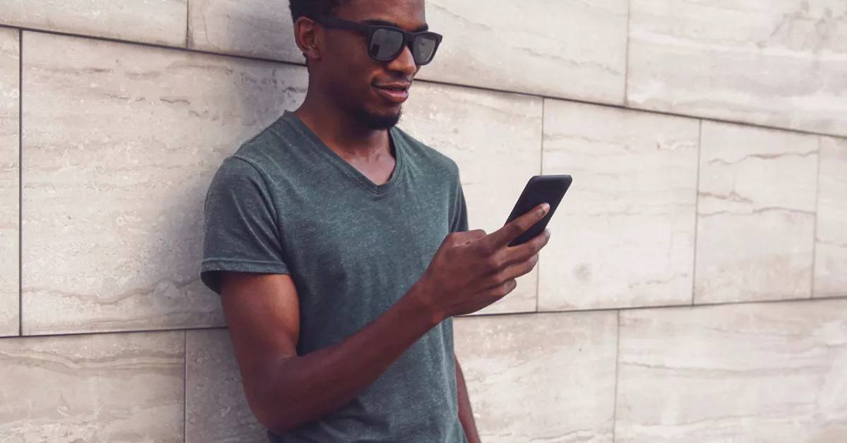 Man checking his messages on the phone